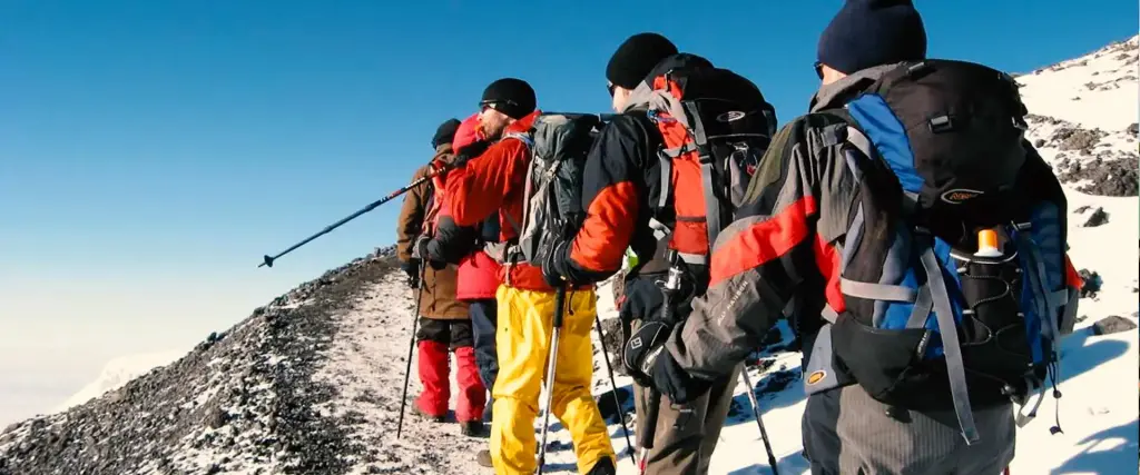 A team of climbers in full gear on Kilimanjaro