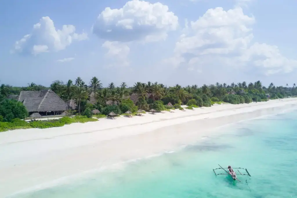 A quiet white-sand beach and turquoise water on Zanzibar